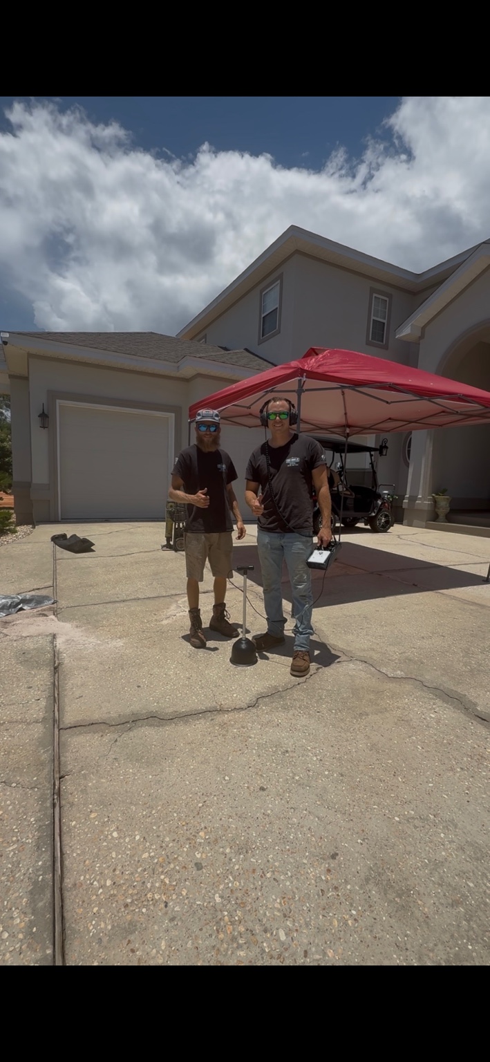 Larry Downs Jr. Plumbing crew performing acoustic leak detection